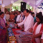 রাজারহাটে সনাতন ধর্মাবলম্বী সম্প্রদায়ের মাঝে শাড়ি বিতরণ